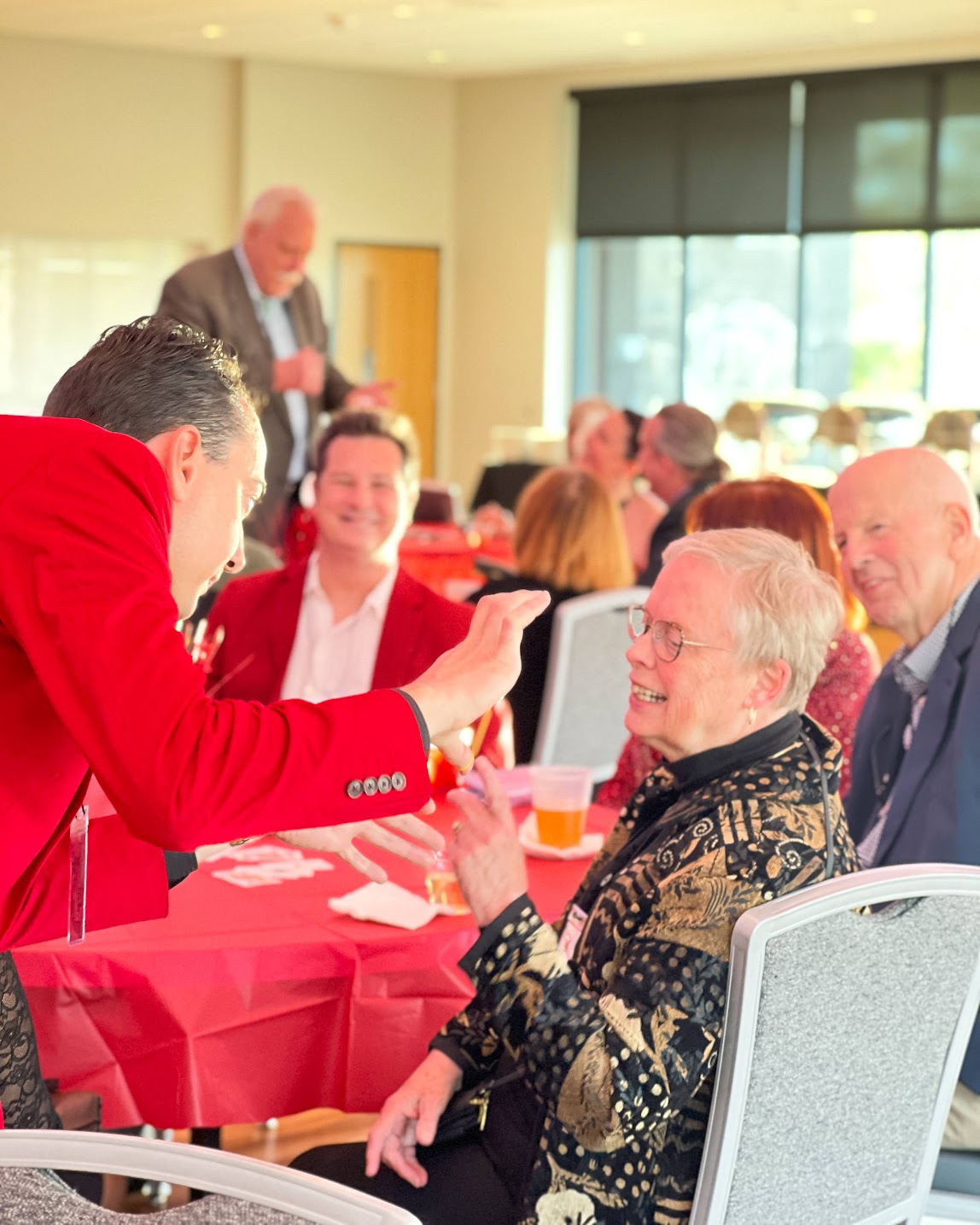 Corporate event guests enjoying a lively group activity